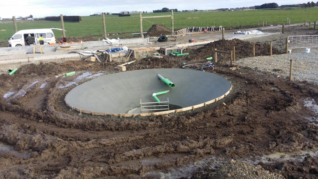 Luke Moretti concrete at his old job, placing an effluent pond on a cow farm.
